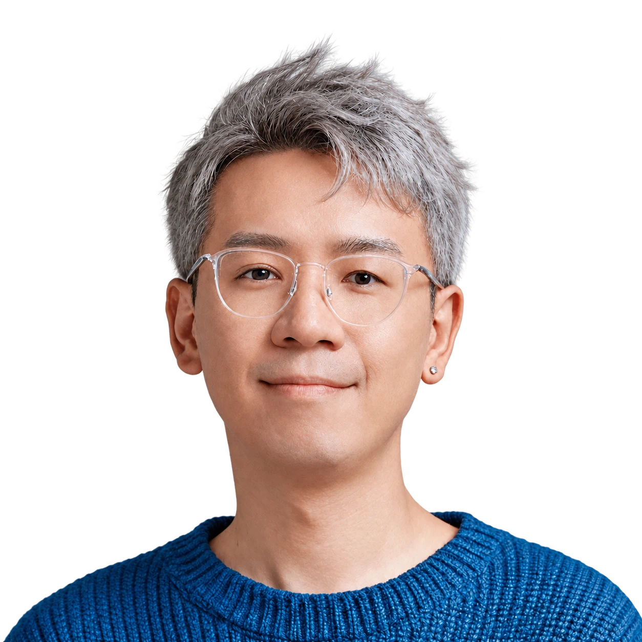 Daniel wearing clear glasses and a blue sweater